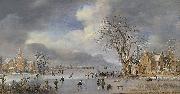 A winter landscape with skaters and kolf players on a frozen river,